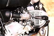 Fuel injection feeds horizontally-opposed cylinders featuring added displacement. 
