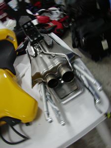 Here's an example of modular design: The whole subframe/muffler is one chunk. 